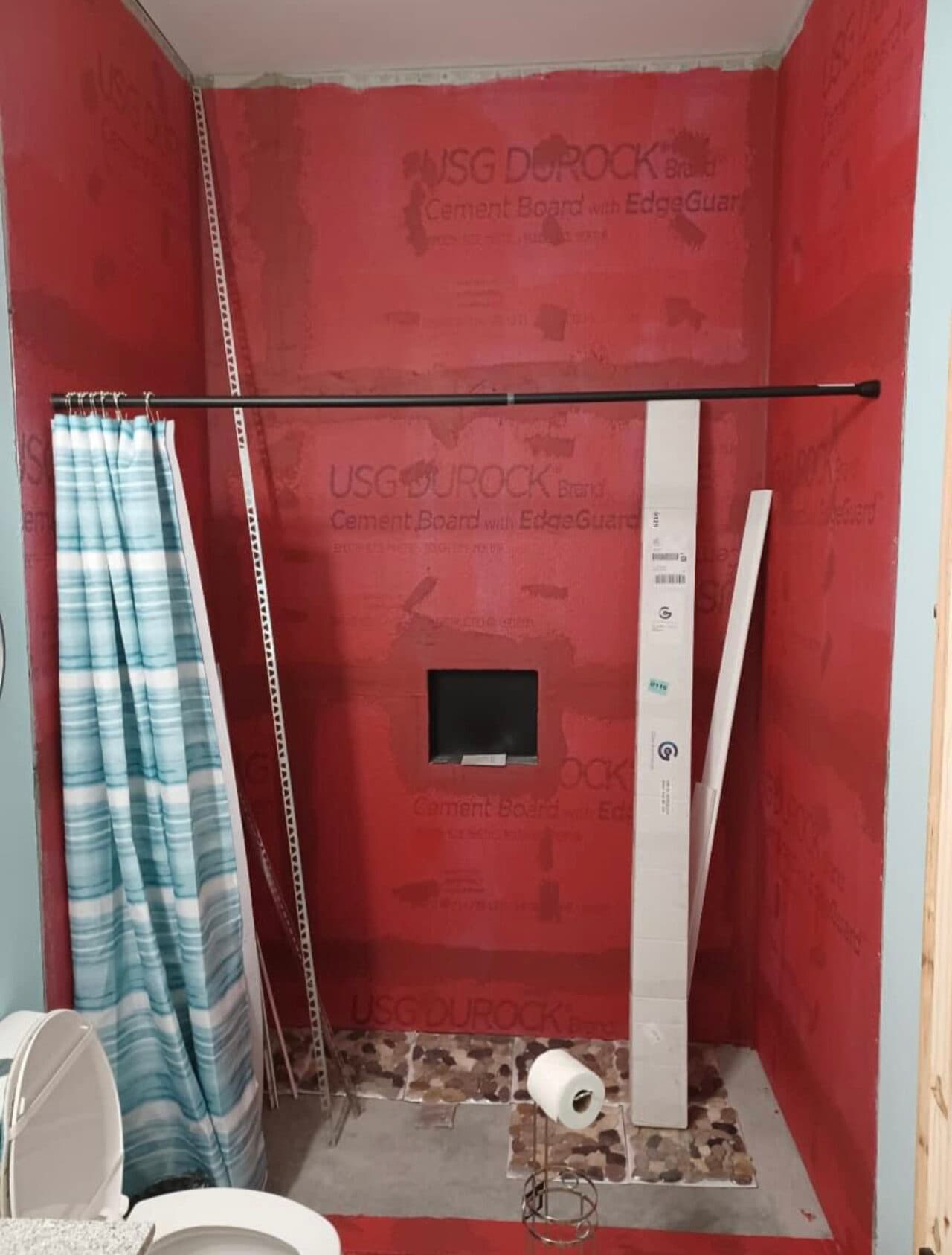 Tiled shower floor and walls