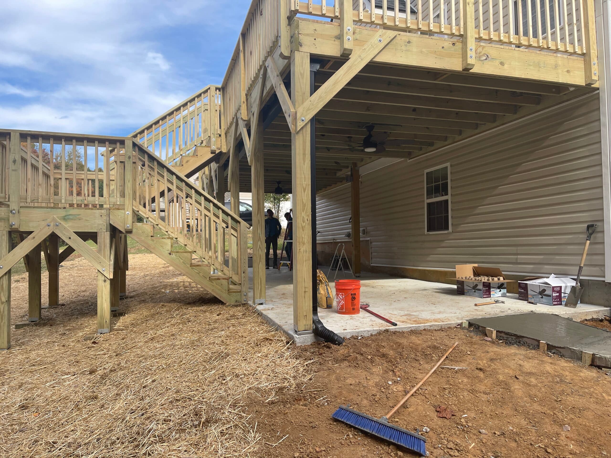 Concrete pad, deck, Trex rain escape - Image 6