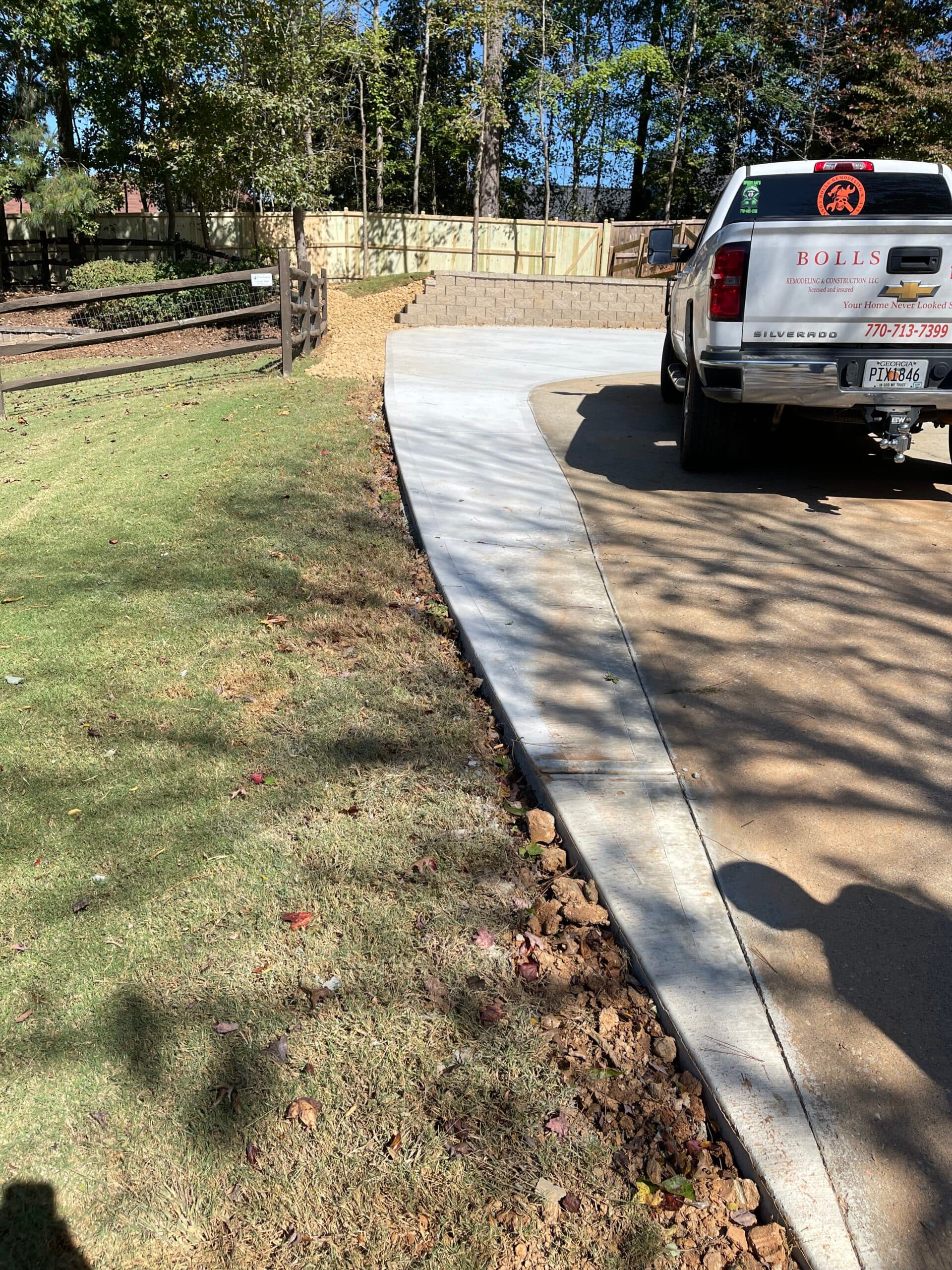 Retaining wall, driveway addition and dry creek bed - Image 6
