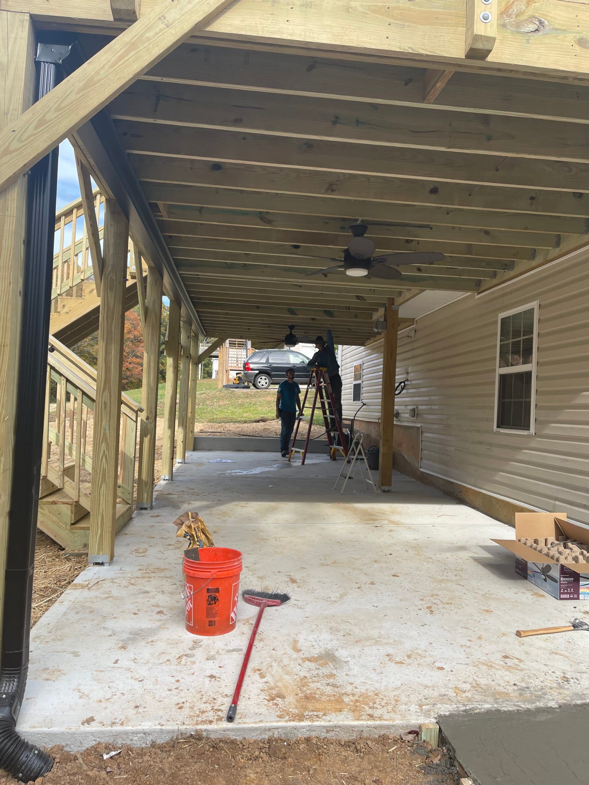 Concrete pad, deck, Trex rain escape - Image 7