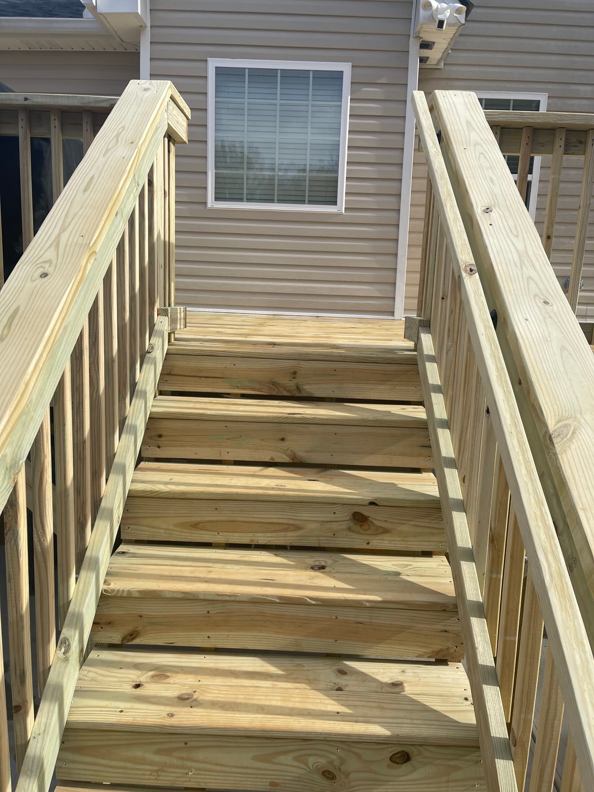 Concrete pad, deck, Trex rain escape - Image 10