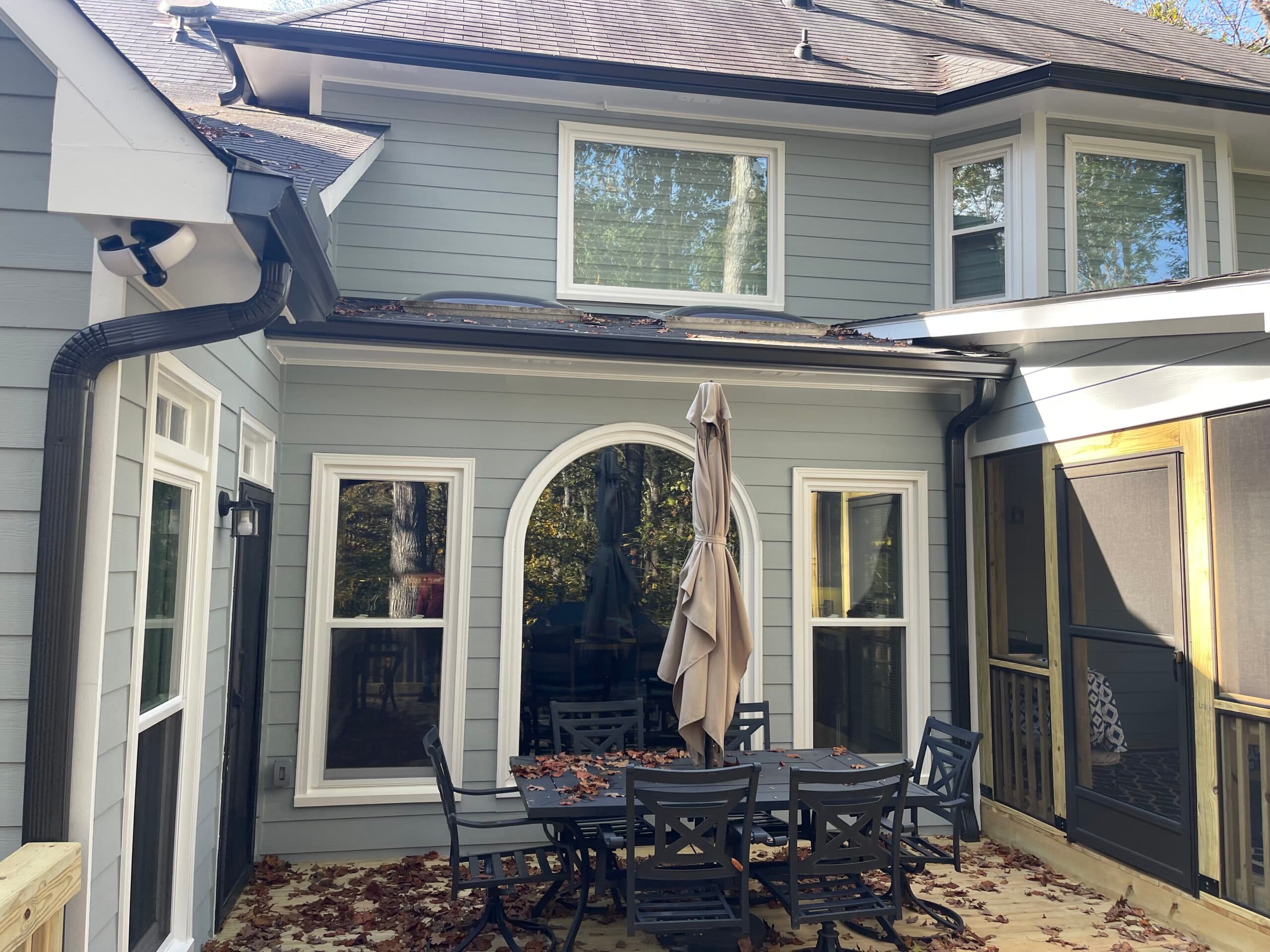 Deck, screen porch and gutters - Image 19