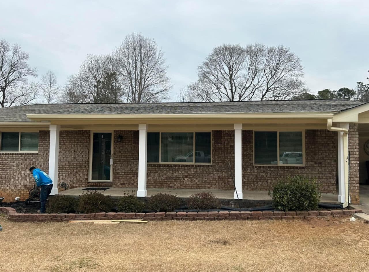 Built shed roof over front porch and replaced siding on gable - Image 2