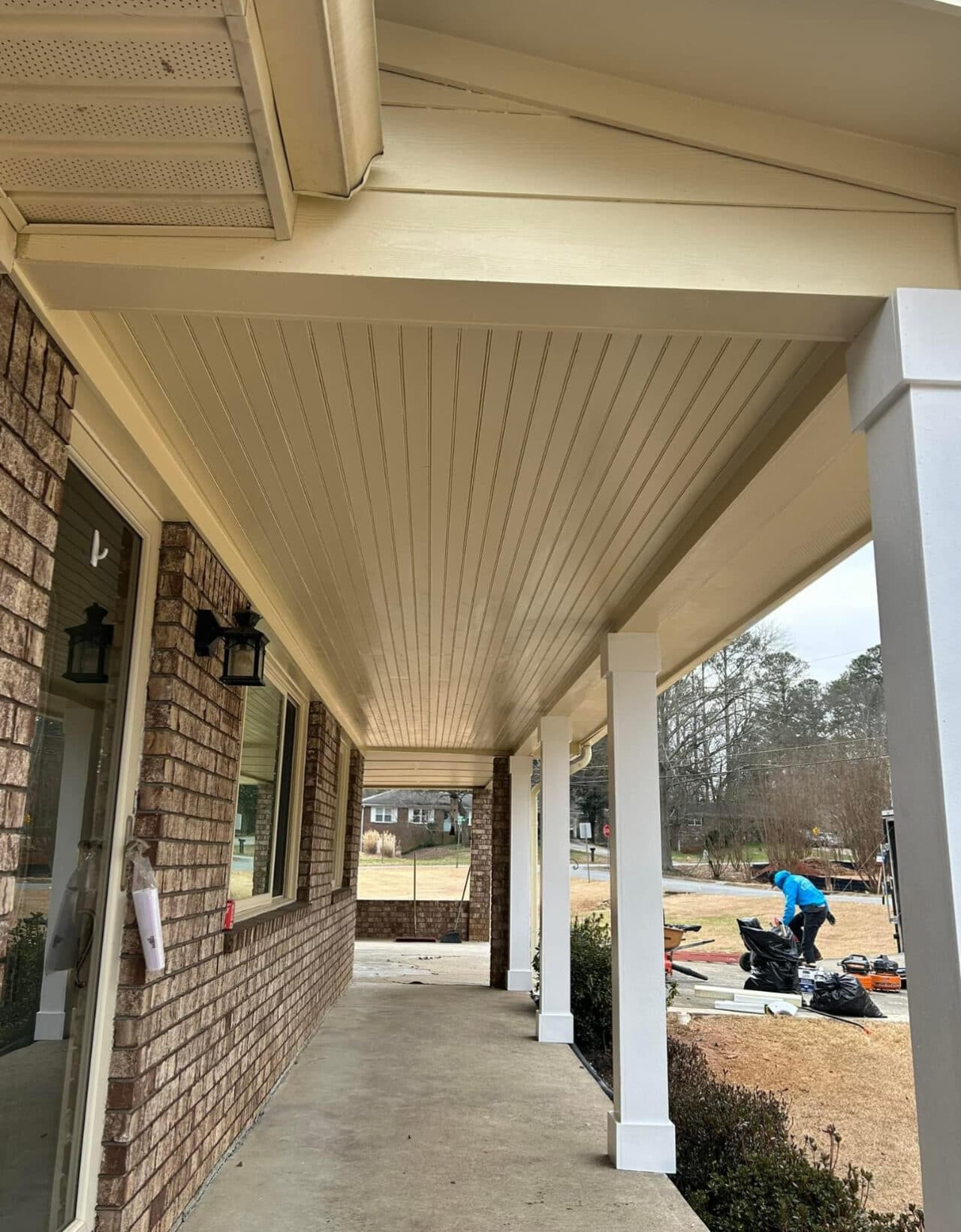 Built shed roof over front porch and replaced siding on gable - Image 4