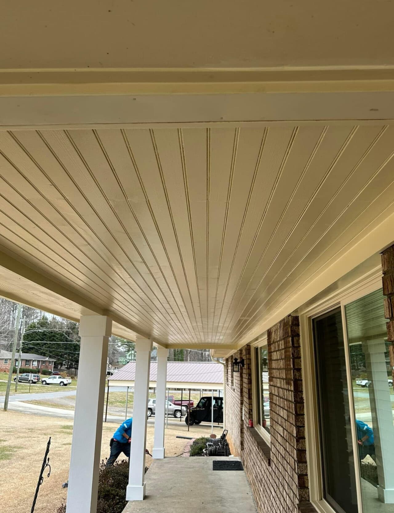Built shed roof over front porch and replaced siding on gable - Image 3